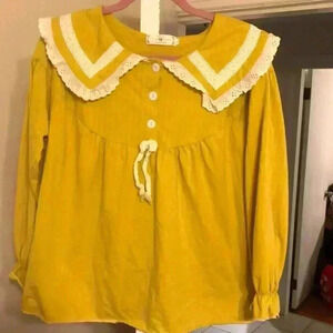 Vogue Homewear unique long sleeve top.